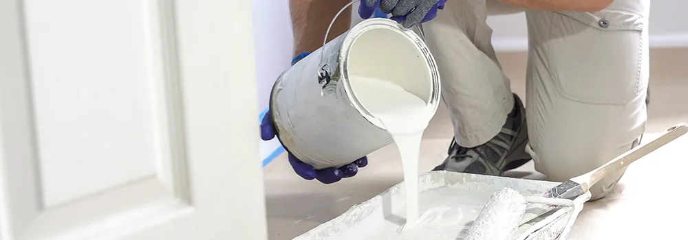 A painter pours out materials that were paid for weeks before the customer's payment arrives